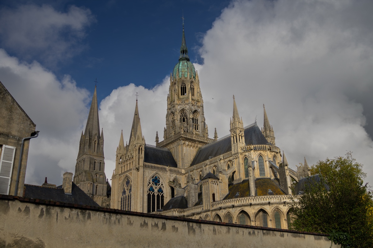 Bayeux Cathedral Spires Over Old Wall